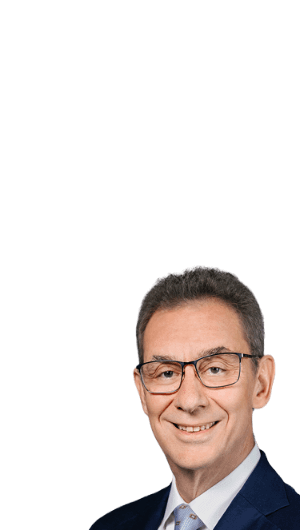 Pfizer CEO and Chairman, Albert Bourla, with text: “We touched the lives of hundreds of millions of patients and strengthened Pfizer in a year of execution and transformation.”